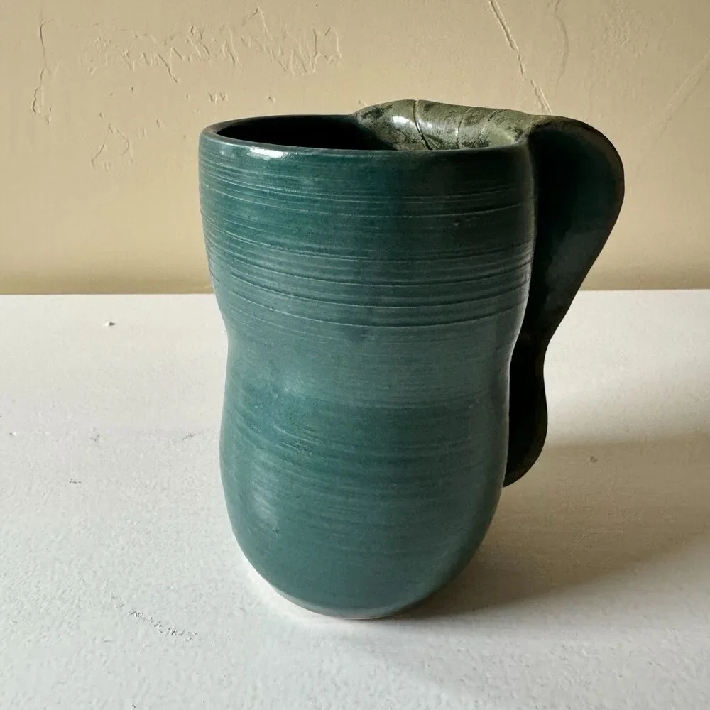Handmade Leaf Handwarmer Ceramic Mug Dark Teal (Left)